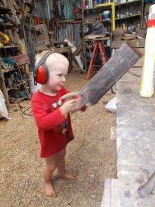 Grandson Henry discovers saws and demolishes my workshop